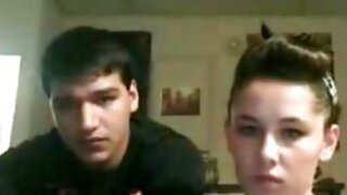Look at this doll with her boyfriend staring into the web camera and looking fierce